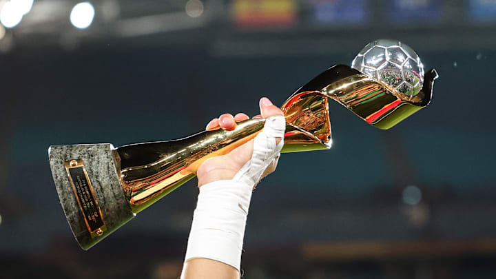 The FIFA Women's World Cup trophy is held high The FIFA Women's World Cup trophy is held high