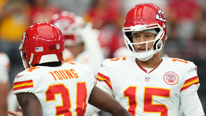 Kansas City Chiefs quarterback Patrick Mahomes (15) greets teammate Elijah Young (34) before their preseason game against the Arizona Cardinals at State Farm Stadium on Aug. 9, 2025. Kansas City Chiefs quarterback Patrick Mahomes (15) greets teammate Elijah Young (34) before their preseason game against the Arizona Cardinals at State Farm Stadium on Aug. 9, 2025.