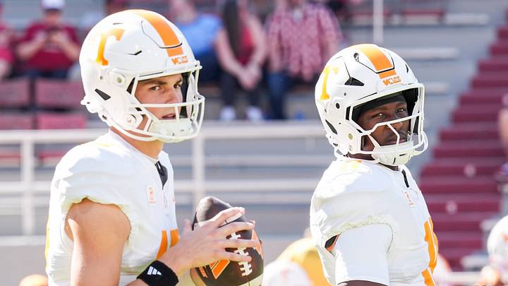 Tennessee quarterback George MacIntyre (12) and Tennessee quarterback Faizon Brandon (11) before a college football game between Tennessee and Arkansas at Donald W. Reynolds Razorback Stadium in Fayetteville, Ark., on Oct. 10, 2026.