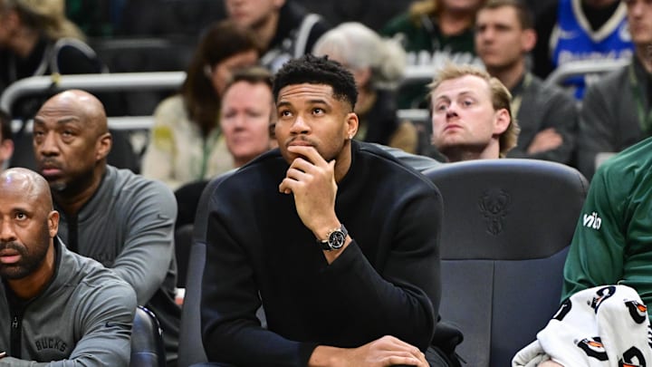 Dec 11, 2025; Milwaukee, Wisconsin, USA; Milwaukee Bucks forward Giannis Antetokounmpo (34) looks on from the bench while recovering from an injury in the second quarter against the Boston Celtics at Fiserv Forum. Mandatory Credit: Benny Sieu-Imagn Images