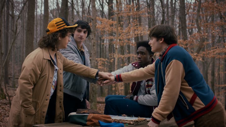 (L to R) Gaten Matarazzo as Dustin Henderson, Finn Wolfhard as Mike Wheeler, Caleb McLaughlin as Lucas Sinclair, and Noah Schnapp as Will Byers in Stranger Things season 5