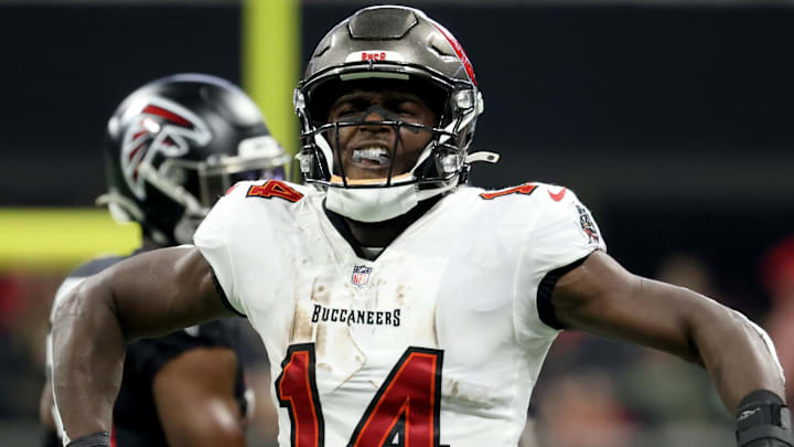 Dec 5, 2021; Atlanta, Georgia, USA; Tampa Bay Buccaneers wide receiver Chris Godwin (14) reacts after making a catch during the fist quarter against the Atlanta Falcons at Mercedes-Benz Stadium. Mandatory Credit: Jason Getz-Imagn Images