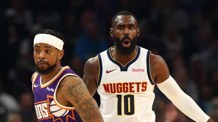 Nov 29, 2025; Phoenix, Arizona, USA; Denver Nuggets guard Tim Hardaway Jr. (10) celebrates a three point shot against Phoenix Suns guard Jordan Goodwin (23) in the first half at the Mortgage Matchup Center.