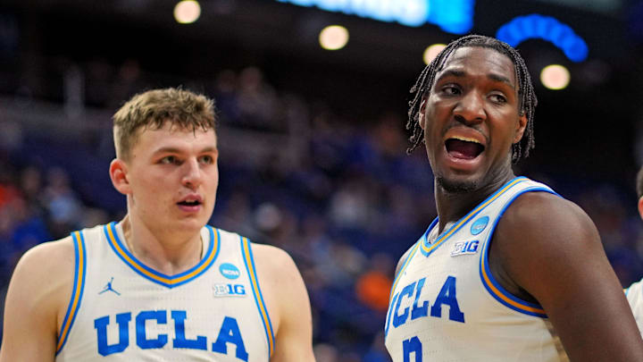 Mar 20, 2025; Lexington, KY, USA;  UCLA Bruins guard Eric Dailey Jr. (3) reacts during the second half against the Utah State Aggies in the first round of the NCAA Tournament at Rupp Arena. Mandatory Credit: Aaron Doster-Imagn Images