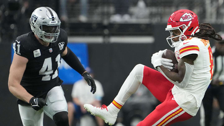 Oct 27, 2024; Paradise, Nevada, USA; Kansas City Chiefs wide receiver DeAndre Hopkins (8) catches the ball against Las Vegas Raiders linebacker Robert Spillane (41) in the first half at Allegiant Stadium. Mandatory Credit: Kirby Lee-Imagn Images