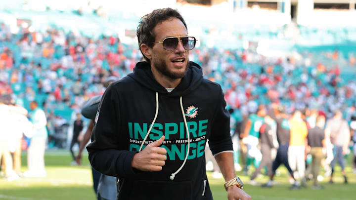 Dec 28, 2025; Miami Gardens, Florida, USA; Miami Dolphins head coach Mike McDaniel runs off the field following a win over the Tampa Bay Buccaneers at Hard Rock Stadium. Mandatory Credit: Sam Navarro-Imagn Images Dec 28, 2025; Miami Gardens, Florida, USA; Miami Dolphins head coach Mike McDaniel runs off the field following a win over the Tampa Bay Buccaneers at Hard Rock Stadium. Mandatory Credit: Sam Navarro-Imagn Images