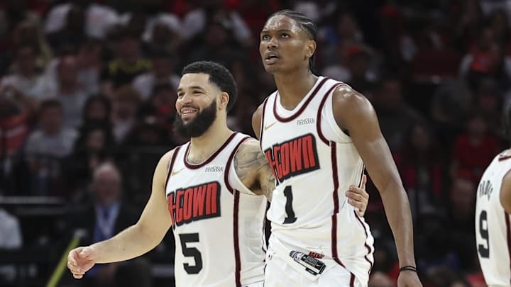 Mar 23, 2025; Houston, Texas, USA; Houston Rockets guard Fred VanVleet (5) and forward Amen Thompson (1) react after a play during the third quarter against the Denver Nuggets at Toyota Center. Mandatory Credit: Troy Taormina-Imagn Images Mar 23, 2025; Houston, Texas, USA; Houston Rockets guard Fred VanVleet (5) and forward Amen Thompson (1) react after a play during the third quarter against the Denver Nuggets at Toyota Center. Mandatory Credit: Troy Taormina-Imagn Images