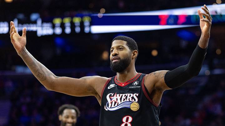 Dec 23, 2025; Philadelphia, Pennsylvania, USA; Philadelphia 76ers forward Paul George (8) reacts after his dunk against the Brooklyn Nets during the second quarter at Xfinity Mobile Arena. Mandatory Credit: Bill Streicher-Imagn Images