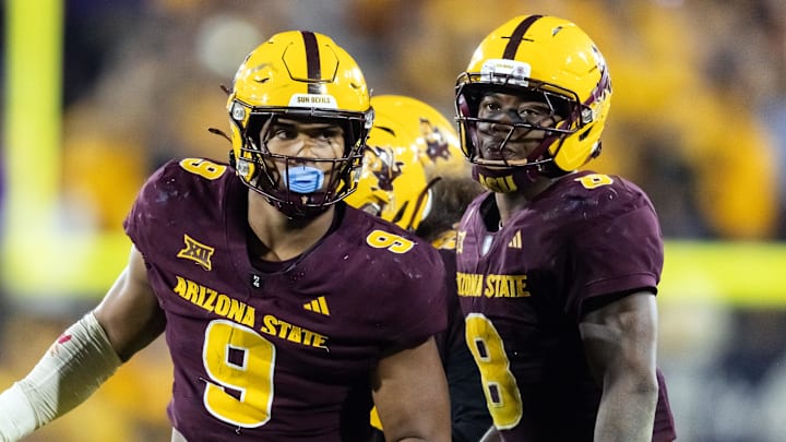 Nov 28, 2025; Tempe, Arizona, USA; Arizona State Sun Devils defensive lineman Elijah O'Neal (9) and linebacker Jordan Crook (8) against the Arizona Wildcats during the 99th Territorial Cup at Mountain America Stadium. Mandatory Credit: Mark J. Rebilas-Imagn Images