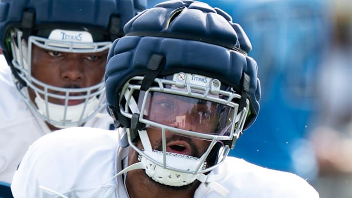 Tennessee Titans outside linebacker Dre'Mont Jones goes through drills during training camp.
