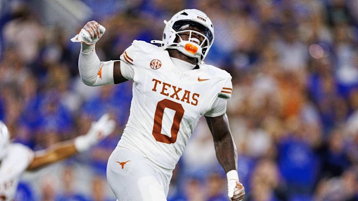 Texas Longhorns linebacker Anthony Hill Jr. (0) celebrates after the Kentucky Wildcats fail to score in overtime at Kroger Field.