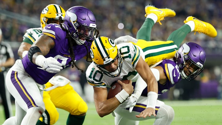 Minnesota Vikings defenders Patrick Jones II and Cam Bynum