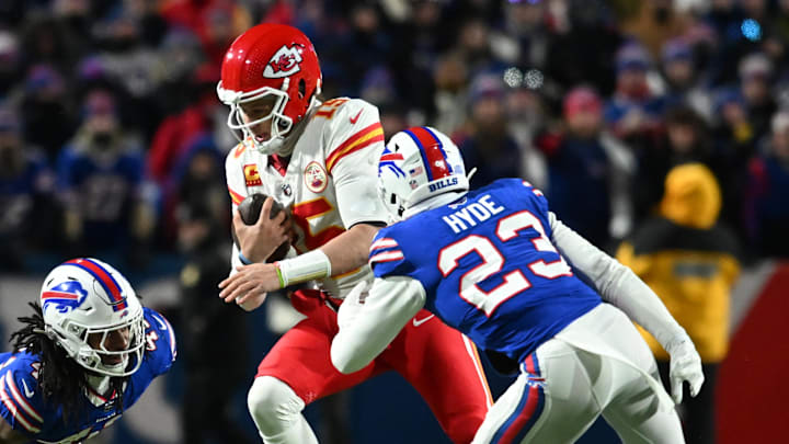 Jan 21, 2024; Orchard Park, New York, USA; Kansas City Chiefs quarterback Patrick Mahomes (15), Buffalo Bills safety Micah Hyde.