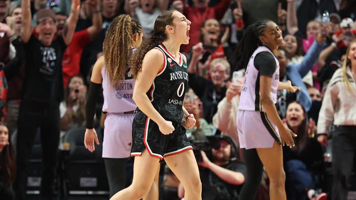 Sep 22, 2026; Portland, Oregon, USA;  Portland Fire guard Carla Leite (0) reacts after scoring against the Golden State Valkyries to give the Fire a 77-75 lead at Moda Center.  Mandatory Credit: Jaime Valdez-Imagn Images