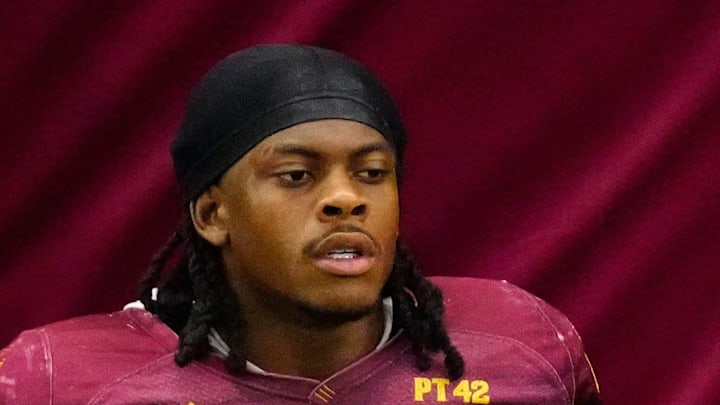 Arizona State running backs Kyson Brown (1) and Raleek Brown (3) take a water break during a practice inside the Verde Dickey Dome in Tempe on August 12, 2025. Arizona State running backs Kyson Brown (1) and Raleek Brown (3) take a water break during a practice inside the Verde Dickey Dome in Tempe on August 12, 2025.