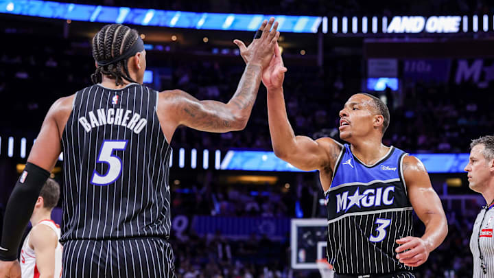 Feb 26, 2026; Orlando, Florida, USA; Orlando Magic guard Desmond Bane (3) and forward Paolo Banchero (5) celebrate during the second quarter against the Houston Rockets at Kia Center. Mandatory Credit: Mike Watters-Imagn Images