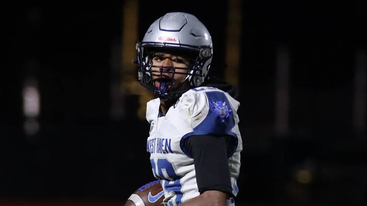 Raines look back as he advances downfield