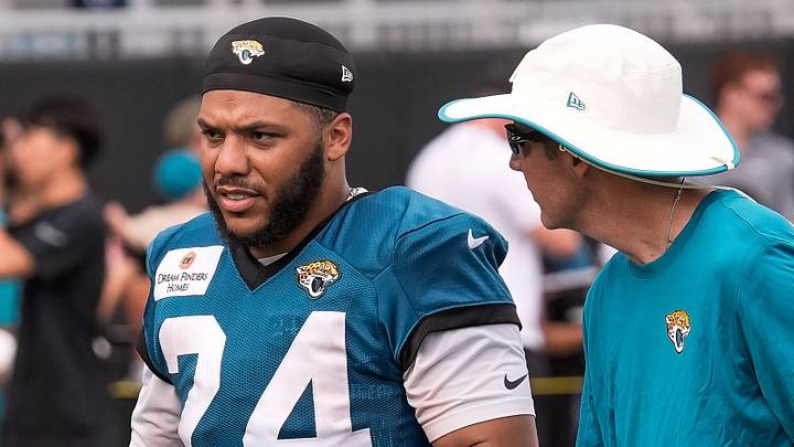 Jacksonville Jaguars Running Back Chris Rodriguez Jr. (24) talks with coach after the fourth day of NFL Training Camp in shells at the Miller Electric Center on Sunday, August 2, 2026, in Jacksonville, Fla.  [Doug Engle/Florida Times-Union]