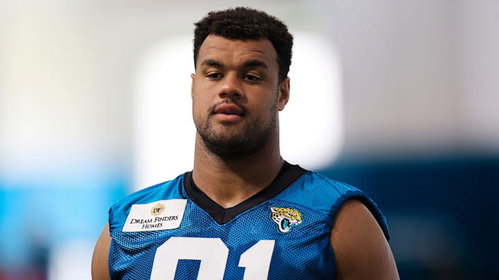 Jacksonville Jaguars defensive lineman Arik Armstead (91) walks to be interviewed after a combined NFL football training camp session between the Tampa Bay Buccaneers and Jacksonville Jaguars Wednesday, Aug. 14, 2024 at EverBank Stadium’s Miller Electric Center in Jacksonville, Fla. [Corey Perrine/Florida Times-Union]