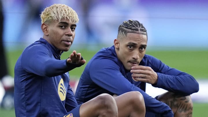 Lamine Yamal (left) and Raphinha are two of the world’s best. 