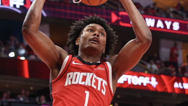 Apr 30, 2025; Houston, Texas, USA; Houston Rockets forward Amen Thompson (1) dunks against the Golden State Warriors in the fourth quarter during game five of first round for the 2025 NBA Playoffs at Toyota Center. Mandatory Credit: Thomas Shea-Imagn Images