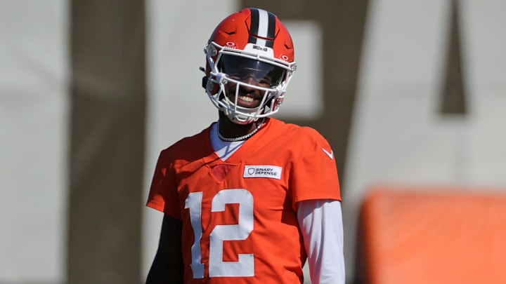 Cleveland Browns quarterback Shedeur Sanders (12) jokes around during NFL training camp practice at the Cleveland Browns training facility, Wednesday, July 23, 2025, in Berea, Ohio.