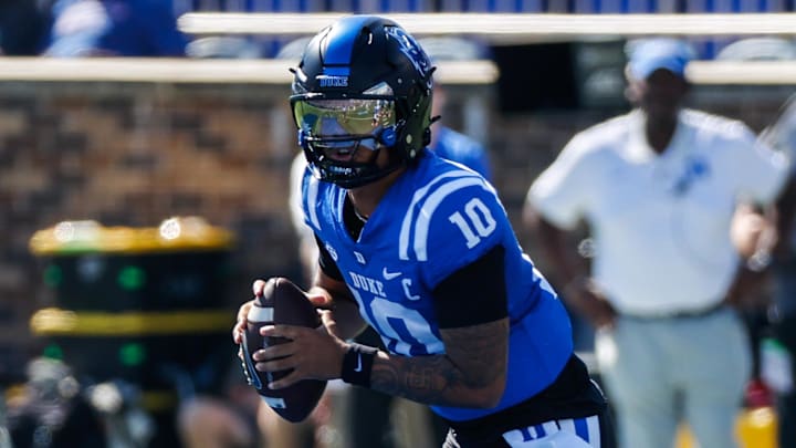 Oct 18, 2025; Durham, North Carolina, USA;  Duke Blue Devils quarterback Darian Mensah (10) runs with the ball  during the first half of the game against Georgia Tech Yellow Jackets at Wallace Wade Stadium. Mandatory Credit: Jaylynn Nash-Imagn Images