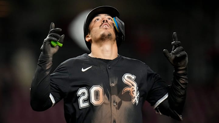 Chicago White Sox third baseman Miguel Vargas (20) celebrates his three-run home run in the 10th inning against the Cincinnati Reds at Great American Ball Park.