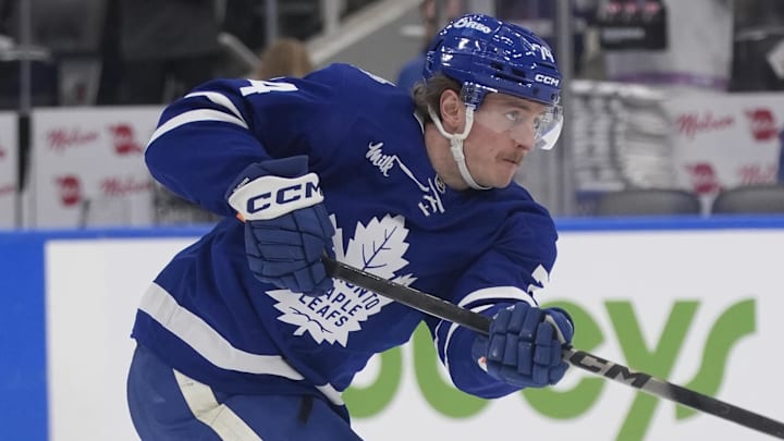 Jan 27, 2026; Toronto, Ontario, CAN; Toronto Maple Leafs forward Bobby McMann (74) shoots the puck during warm up before a game against the Buffalo Sabres at Scotiabank Arena. Mandatory Credit: John E. Sokolowski-Imagn Images