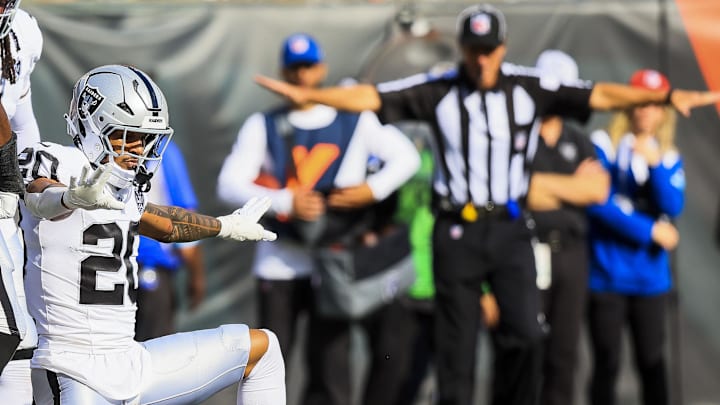 Nov 3, 2024; Cincinnati, Ohio, USA; Las Vegas Raiders safety Isaiah Pola-Mao (20) reacts after breaking up a pass intended for Cincinnati Bengals wide receiver Trenton Irwin (16) in the first half at Paycor Stadium. Mandatory Credit: Katie Stratman-Imagn Images