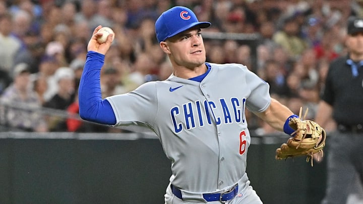 Mar 28, 2025; Phoenix, Arizona, USA; Chicago Cubs second base Matt Shaw (6) fields a bunt in the fourth inning against the Arizona Diamondbacks at Chase Field Mar 28, 2025; Phoenix, Arizona, USA; Chicago Cubs second base Matt Shaw (6) fields a bunt in the fourth inning against the Arizona Diamondbacks at Chase Field