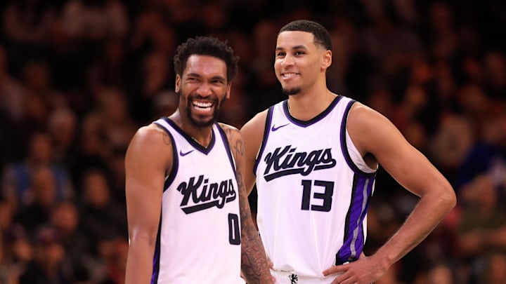 Mar 14, 2025; Phoenix, Arizona, USA; Sacramento Kings guard Malik Monk (0) and forward Keegan Murray (13) against the Phoenix Suns at Footprint Center.