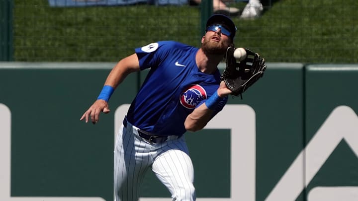 Chicago Cubs third base Gage Workman (25) makes the running catch in the outfield. 