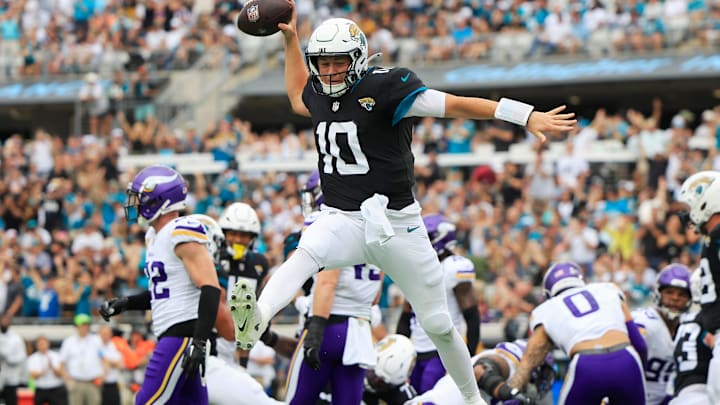 Jacksonville Jaguars quarterback Mac Jones (10) spikes the ball after scoring a touchdown during the first quarter of an NFL football matchup Sunday, Nov. 10, 2024 at Everbank Stadium in Jacksonville, Fla. [Corey Perrine/Florida Times-Union]