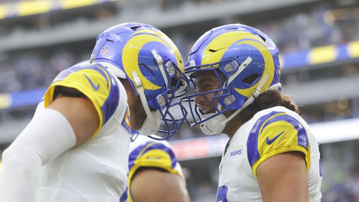 Dec 3, 2023; Inglewood, California, USA; Los Angeles Rams quarterback Mathew Stafford (9) celebrates with Los Angeles Rams wide receiver Puka Nacua (17) after scoring a touchdown in the first half in a game against the Cleveland Browns at SoFi Stadium. Mandatory Credit: Yannick Peterhans-Imagn Images