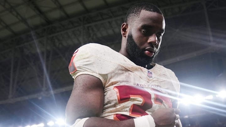 Arizona Cardinals running back Trey Benson (33) walks off the field after their 23-20 loss to the Seattle Seahawks at State Farm Stadium in Glendale on Sept. 25, 2025.
