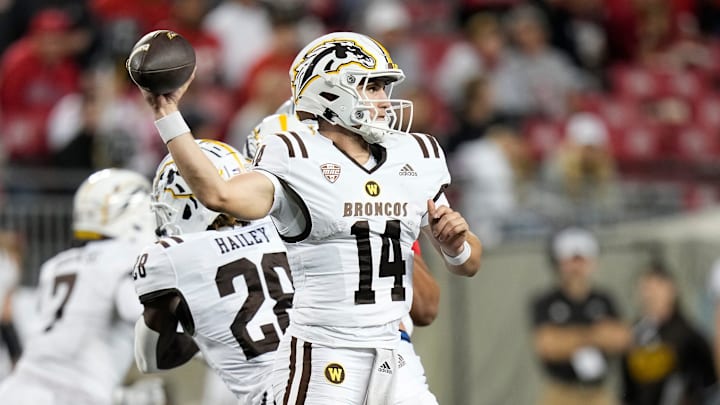 Sep 7, 2024; Columbus, Ohio, USA; Western Michigan Broncos quarterback Broc Lowry (14) throws a pass during the second half of the NCAA football game against the Ohio State Buckeyes at Ohio Stadium.