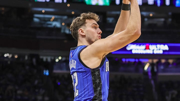 Apr 25, 2025; Orlando, Florida, USA; Orlando Magic forward Franz Wagner (22) shoots a three point basket during the first quarter of game three of first round for the 2024 NBA Playoffs against the Boston Celtics at Kia Center. Mandatory Credit: Mike Watters-Imagn Images