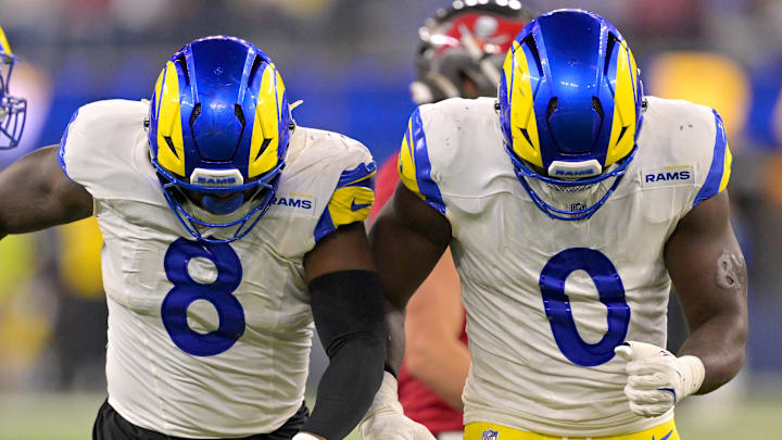Nov 23, 2025; Inglewood, California, USA; Los Angeles Rams linebacker Jared Verse (8) and linebacker Byron Young (0) celebrate after a sack of Tampa Bay Buccaneers quarterback Teddy Bridgewater (10) in the second half at SoFi Stadium. Mandatory Credit: Jayne Kamin-Oncea-Imagn Images Nov 23, 2025; Inglewood, California, USA; Los Angeles Rams linebacker Jared Verse (8) and linebacker Byron Young (0) celebrate after a sack of Tampa Bay Buccaneers quarterback Teddy Bridgewater (10) in the second half at SoFi Stadium. Mandatory Credit: Jayne Kamin-Oncea-Imagn Images