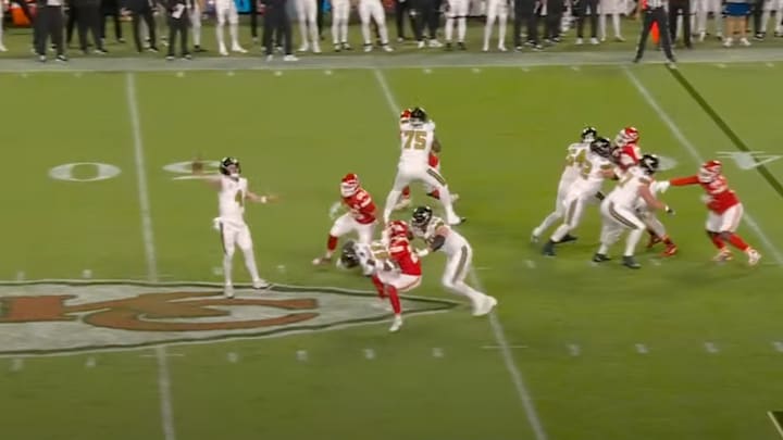 Derek Carr decides to see how far he can throw the ball while fading away. Derek Carr decides to see how far he can throw the ball while fading away.