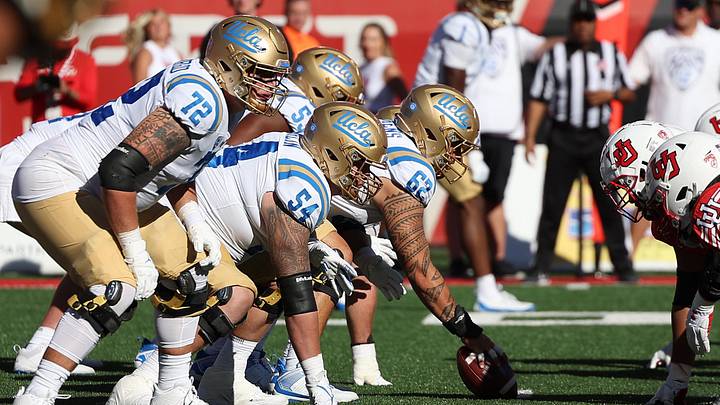Sep 23, 2023; Salt Lake City, Utah, USA; UCLA Bruins offense lines up against the Utah Utes defense in the fourth quarter at Rice-Eccles Stadium. Mandatory Credit: Rob Gray-Imagn Images Sep 23, 2023; Salt Lake City, Utah, USA; UCLA Bruins offense lines up against the Utah Utes defense in the fourth quarter at Rice-Eccles Stadium. Mandatory Credit: Rob Gray-Imagn Images