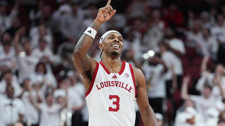 Louisville Cardinals guard Ryan Conwell (3) celebrates 