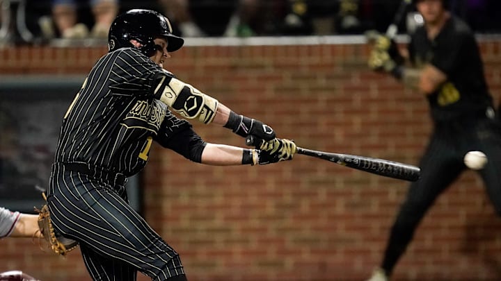 Vanderbilt designated hitter Mac Rose (16) connects for a single against Arkansas during the fifth inning at Hawkins Field in Nashville, Tenn., Friday, March 28, 2025. Vanderbilt designated hitter Mac Rose (16) connects for a single against Arkansas during the fifth inning at Hawkins Field in Nashville, Tenn., Friday, March 28, 2025.