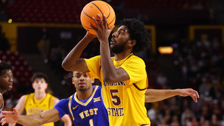 Jan 21, 2026; Tempe, Arizona, USA; Arizona State Sun Devils guard Maurice Odum (5) against the West Virginia Mountaineers in the second half at Desert Financial Arena. Mandatory Credit: Mark J. Rebilas-Imagn Images Jan 21, 2026; Tempe, Arizona, USA; Arizona State Sun Devils guard Maurice Odum (5) against the West Virginia Mountaineers in the second half at Desert Financial Arena. Mandatory Credit: Mark J. Rebilas-Imagn Images