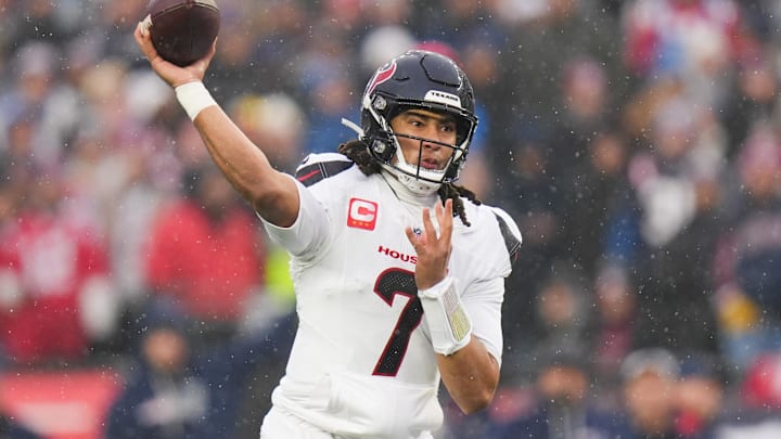Jan 18, 2026; Foxborough, MA, USA; Houston Texans quarterback C.J. Stroud (7) throws in the first quarter against the New England Patriots in an AFC Divisional Round game at Gillette Stadium. Mandatory Credit: Brian Fluharty-Imagn Images