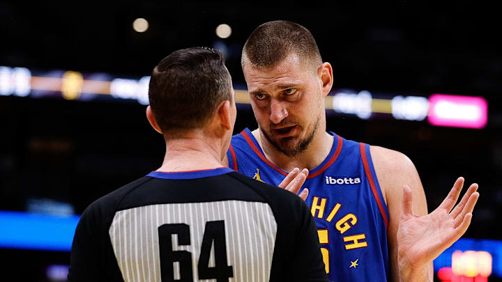 Dec 3, 2024; Denver, Colorado, USA; Denver Nuggets center Nikola Jokic (15) talks with referee Justin Van Duyne (64) in the second quarter against the Golden State Warriors at Ball Arena. Dec 3, 2024; Denver, Colorado, USA; Denver Nuggets center Nikola Jokic (15) talks with referee Justin Van Duyne (64) in the second quarter against the Golden State Warriors at Ball Arena.