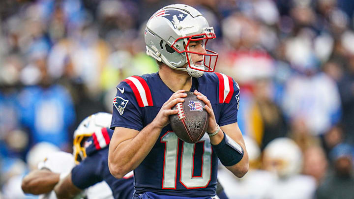 Dec 28, 2024; Foxborough, Massachusetts, USA; New England Patriots quarterback Drake Maye (10) looks to pass the ball against the Los Angeles Chargers in the first half at Gillette Stadium. Mandatory Credit: David Butler II-Imagn Images