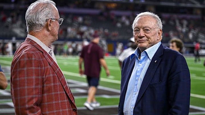 Sep 24, 2022; Arlington, Texas, USA; Dallas Cowboys owner Jerry Jones (right) and son Stephen Jones