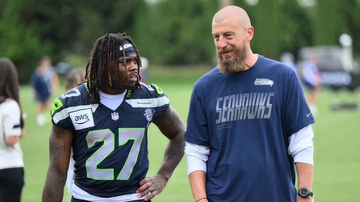 Jul 25, 2026; Renton, WA, USA; Seattle Seahawks running back Emanuel Wilson (27) and offensive coordinator Brian Fleury after the first training camp at Virginia Mason Athletic Center. Mandatory Credit: Steven Bisig-Imagn Images Jul 25, 2026; Renton, WA, USA; Seattle Seahawks running back Emanuel Wilson (27) and offensive coordinator Brian Fleury after the first training camp at Virginia Mason Athletic Center. Mandatory Credit: Steven Bisig-Imagn Images