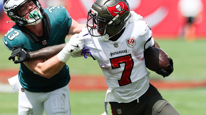 Sep 28, 2025; Tampa, Florida, USA; Tampa Bay Buccaneers running back Bucky Irving (7) attempts to stiff arm Philadelphia Eagles cornerback Cooper Dejean (33) during the first quarter at Raymond James Stadium. Mandatory Credit: Nathan Ray Seebeck-Imagn Images Sep 28, 2025; Tampa, Florida, USA; Tampa Bay Buccaneers running back Bucky Irving (7) attempts to stiff arm Philadelphia Eagles cornerback Cooper Dejean (33) during the first quarter at Raymond James Stadium. Mandatory Credit: Nathan Ray Seebeck-Imagn Images